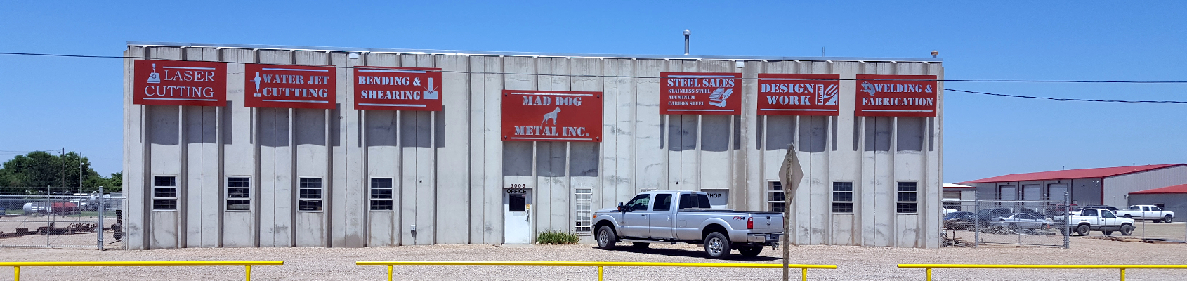 outside view of Mad Dog Metal building